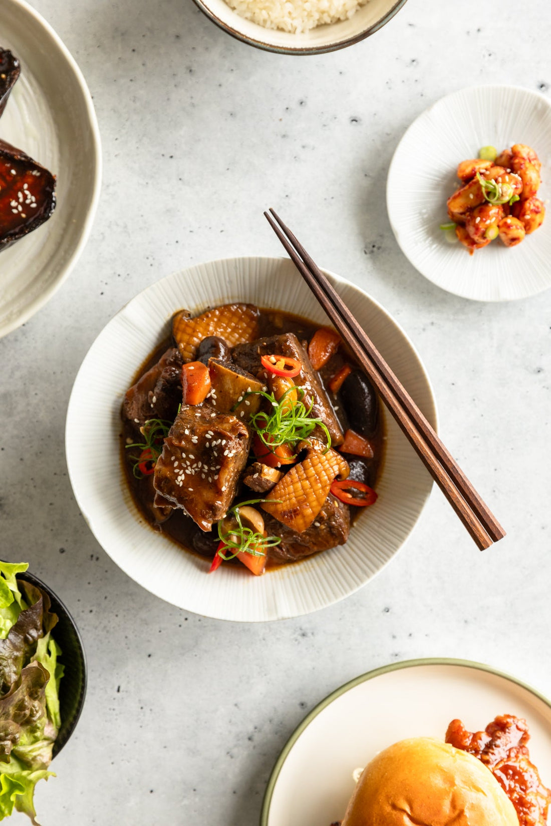 Hearty Korean food. Korean braised short ribs - galbijjim with cham cham honey pepper ganjang.