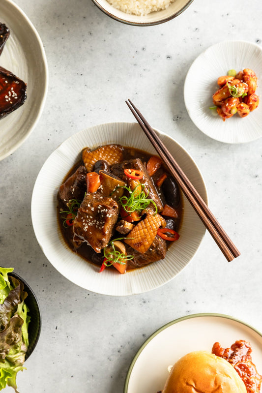 Hearty Korean food. Korean braised short ribs - galbijjim with cham cham honey pepper ganjang.